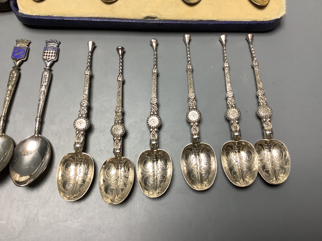 Three cased sets including silver teaspoons, a silver toast rack, three silver napkin rings and a quantity of minor silver flatware.